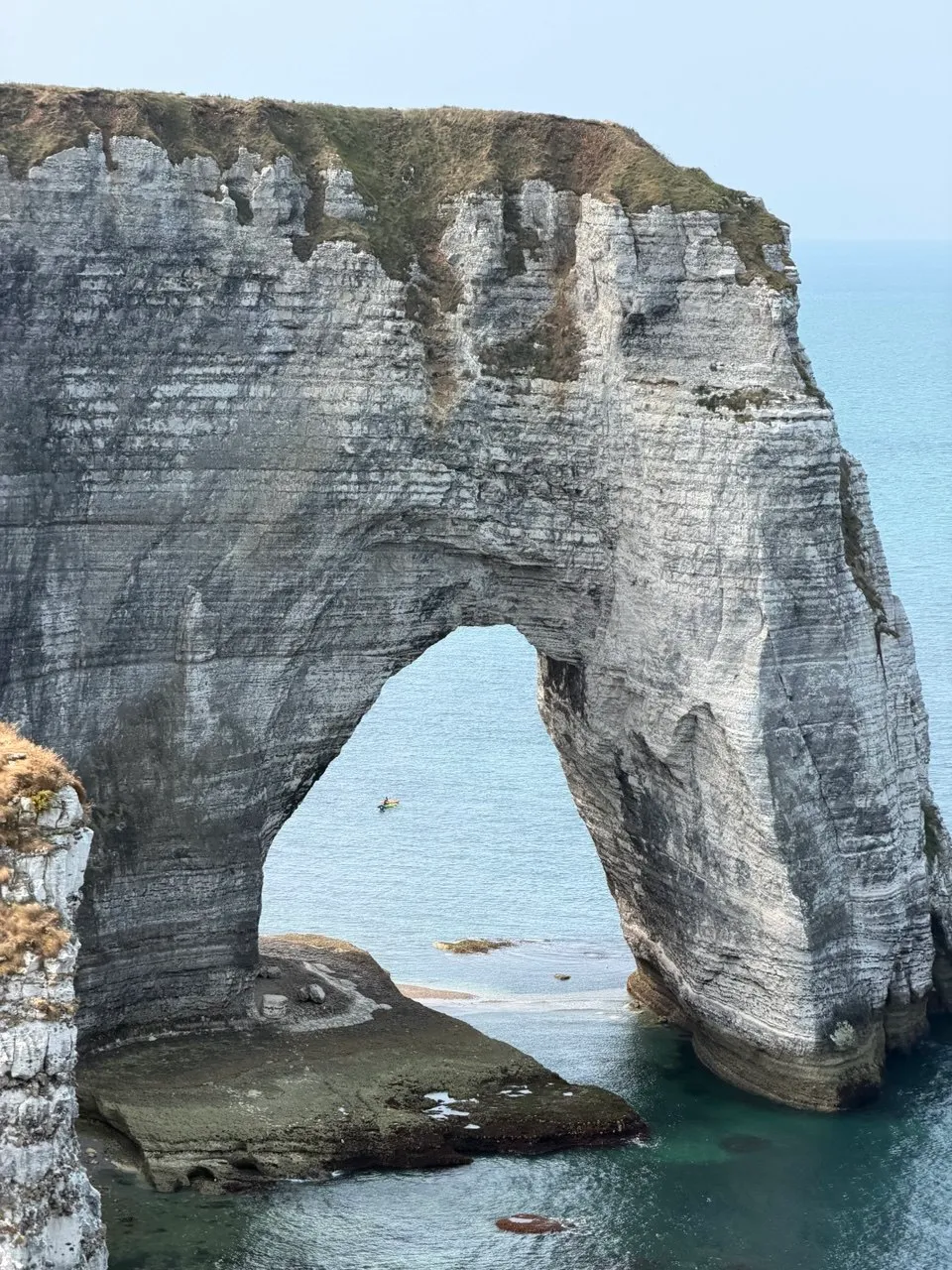 A close view through the monumental natural arch at Étretat