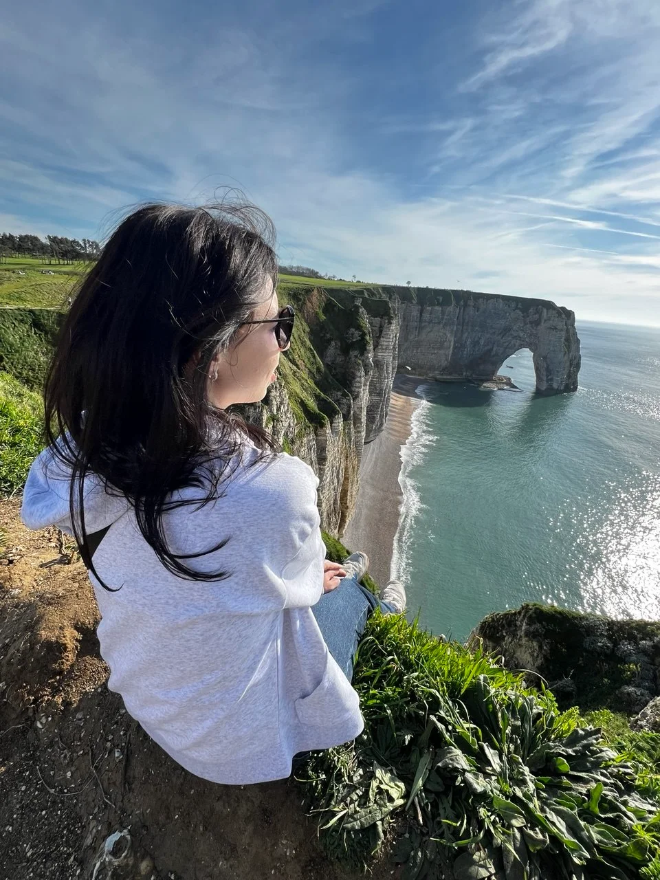 A ProTours guest enjoying the view over the Étretat arch and sea