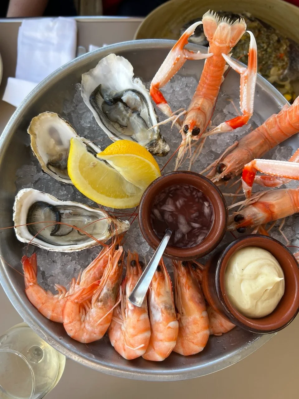 Fresh oysters, prawns and seafood served during lunch in Étretat